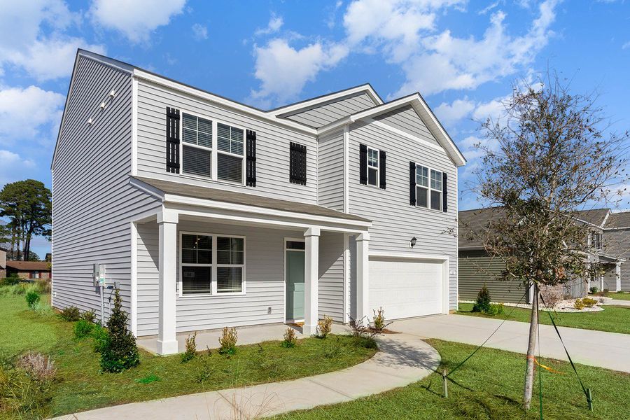 Front exterior of a home in the Island Green community, located in Myrtle Beach, SC (Image 11).