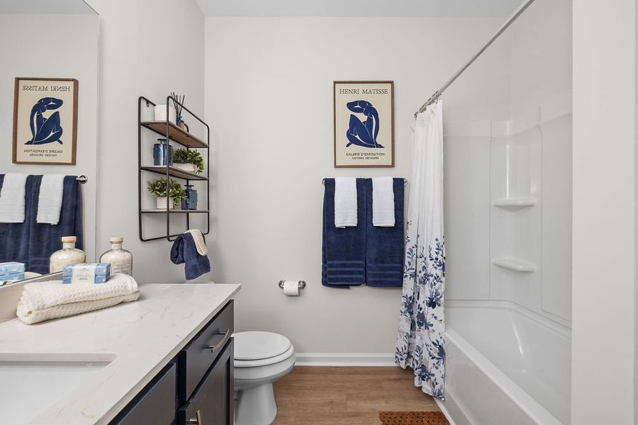 Furnished interior in a model home at Belair East in Statesboro (Image 10).