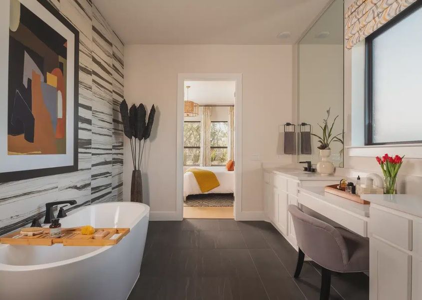 Furnished interior in a model home at Parmer Ranch in Georgetown (Image 24).