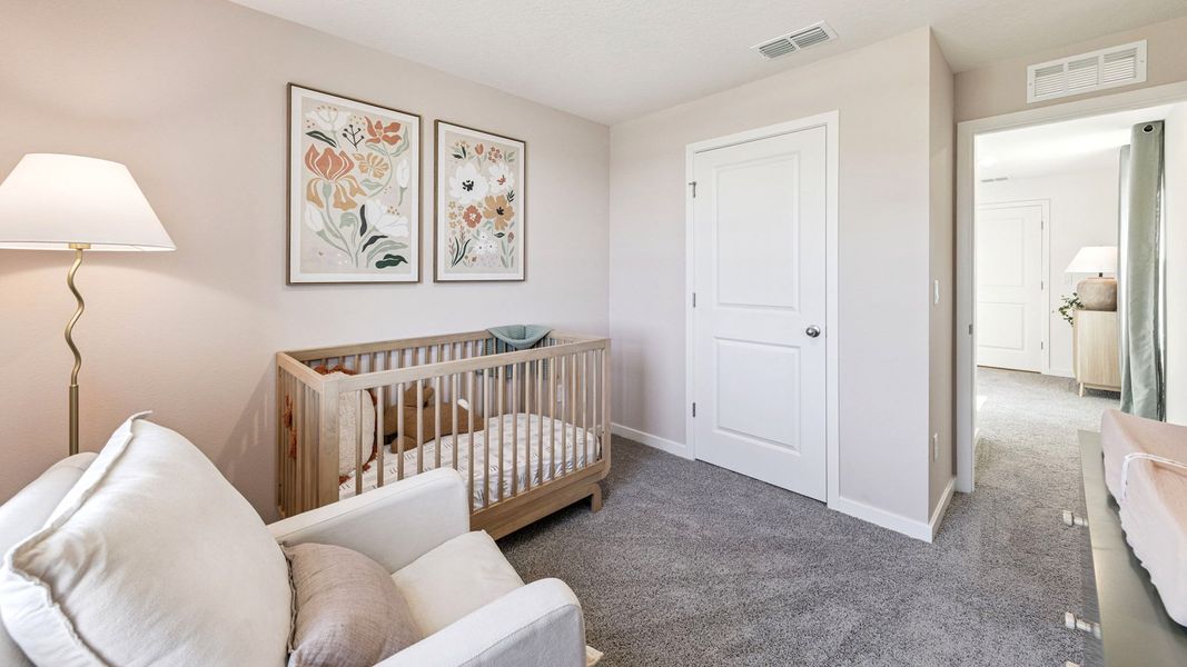 Furnished interior in a model home at Vineland Reserve in Osteen (Image 11).