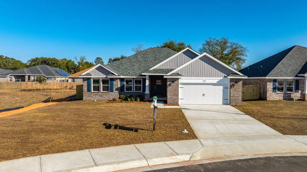 Front exterior of a home in the Buckeye's Landing community, located in Navarre, FL (Image 6).