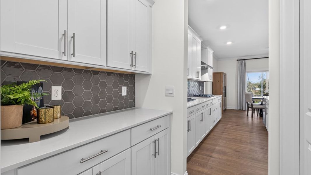 Furnished interior in a model home at The Grove at Winston Pointe in Clayton (Image 8).