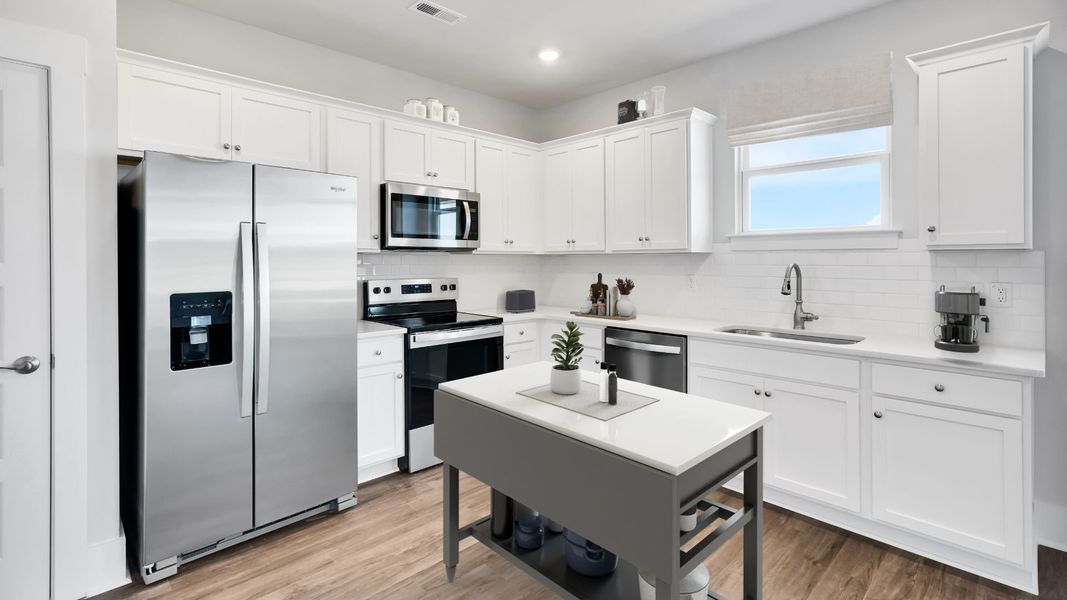 Furnished interior in a model home at The Pines at Blake Farm in Wilmington (Image 8).