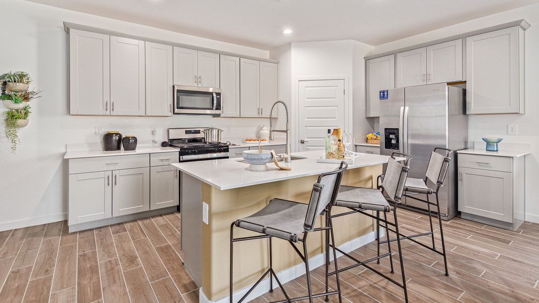 Furnished interior in a model home at Redford Estates in Tucson (Image 10).