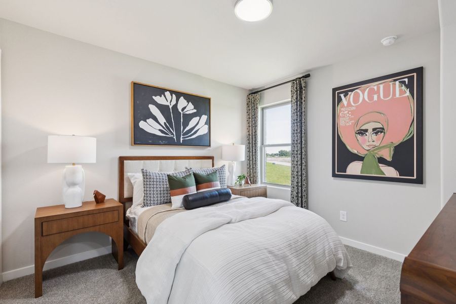 Bedroom in a Lowry Trails New Magnolia Model in Princeton TX by Trophy Signature Homes