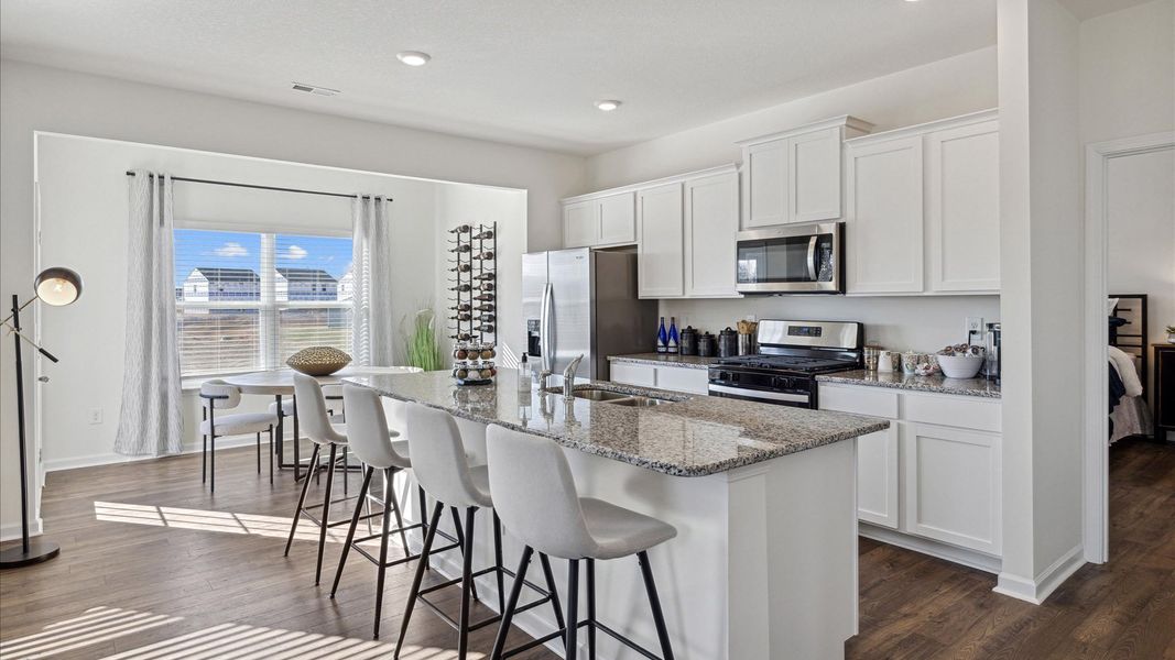 Furnished interior in a model home at The Hideaway at Fox Meadows in Bluff City (Image 2).