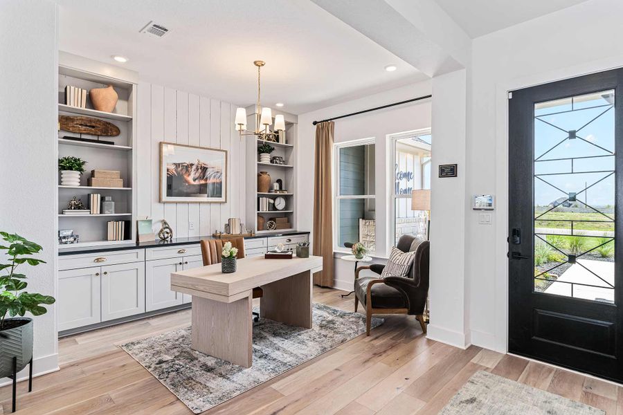 Furnished interior in a model home at Kissing Tree – Vista Series in San Marcos (Image 8).