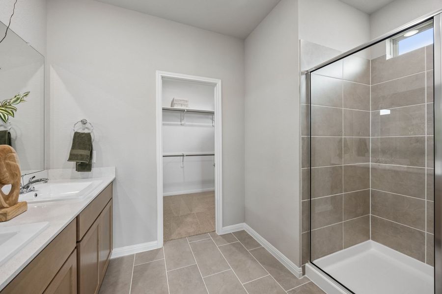 Primary Bathroom in the Oak Model Home by Trophy Signature Homes