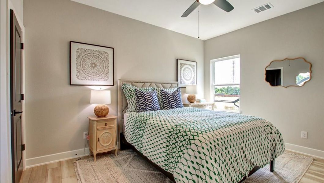 Furnished interior in a model home at Sunterra 40 in Katy (Image 41).