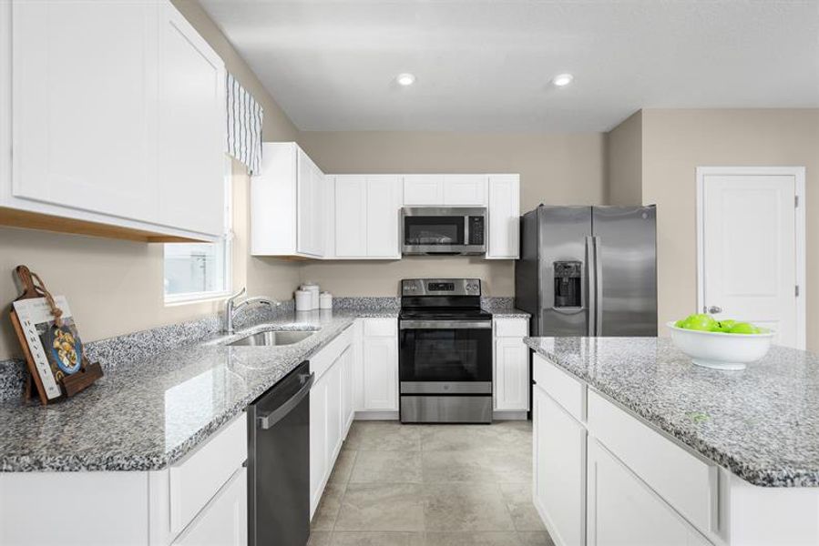 Furnished interior in a model home at Heritage Station in Punta Gorda (Image 2).