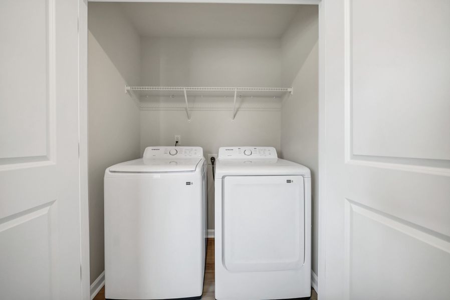 Furnished interior in a model home at Percival Village in Columbia (Image 18).