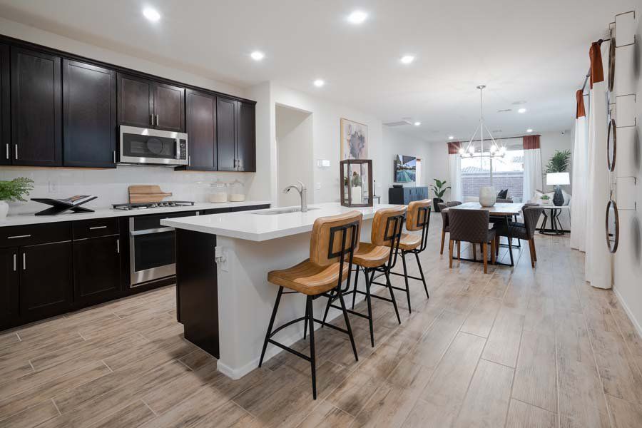 Furnished interior in a model home at Beacon Hill at Marley Park in Surprise (Image 35).
