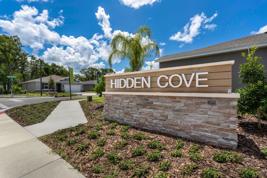 Entrance to the Hidden Cove community in Eustis, FL, featuring signage and landscaping (Image 2). Entrance to the Hidden Cove community in Eustis, FL, featuring signage and landscaping (Image 2).