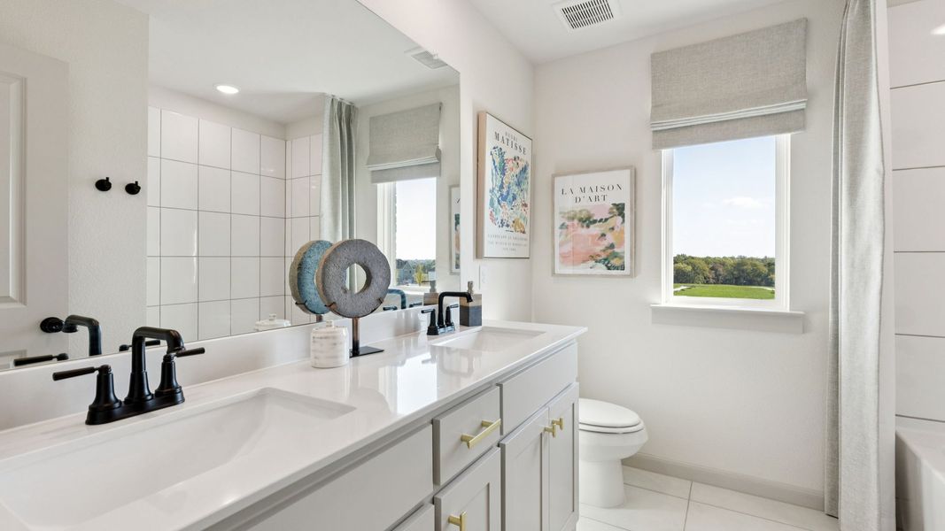 Furnished interior in a model home at Painted Tree - Woodland North in McKinney (Image 28).
