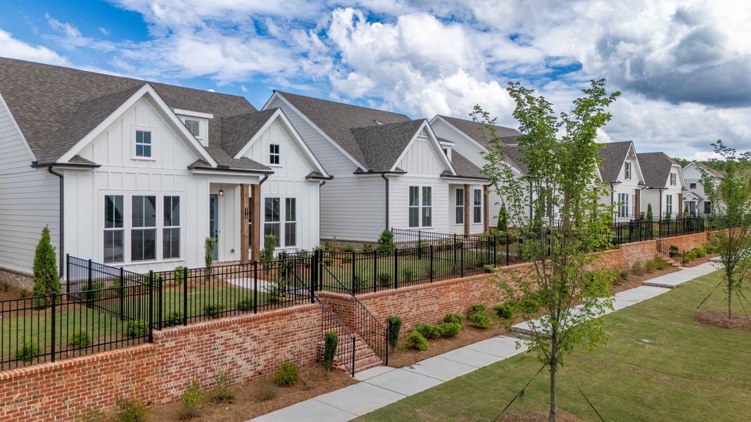 Front exterior of a home in the Promenade at Sawnee Village community, located in Cumming, GA (Image 10).