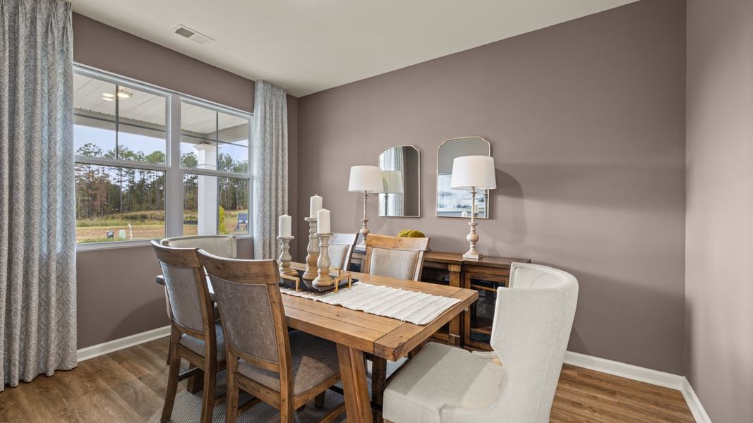 Furnished interior in a model home at Oakchase at Hampton in Hampton (Image 22).