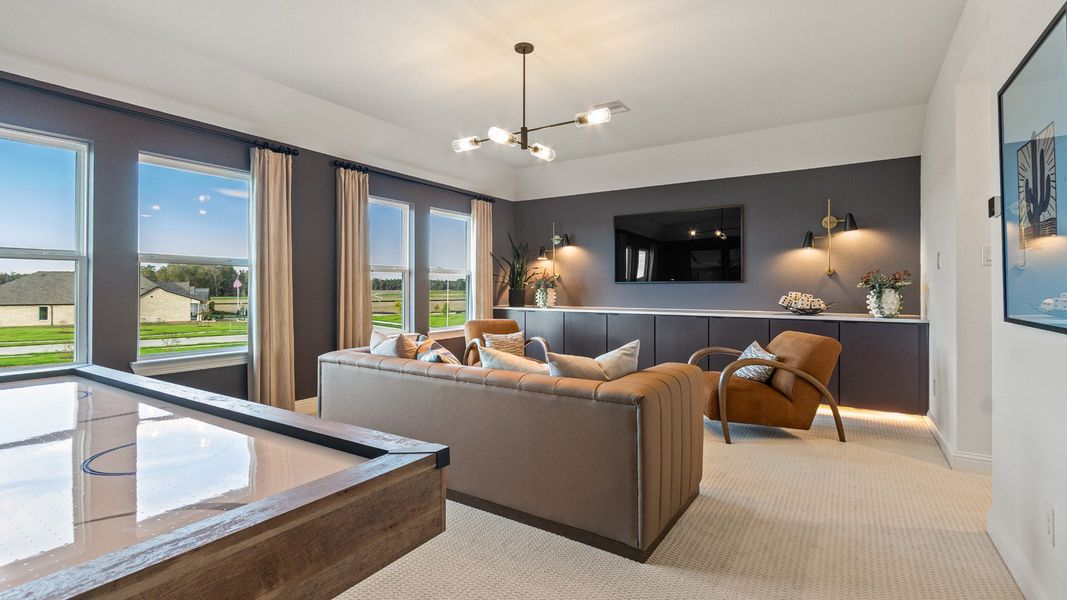 Furnished interior in a model home at Sundance Cove in Crosby (Image 32).