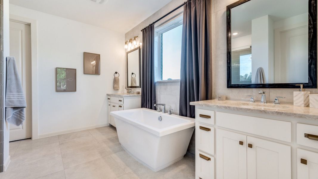 Furnished interior in a model home at Painted Tree - South in McKinney (Image 10).