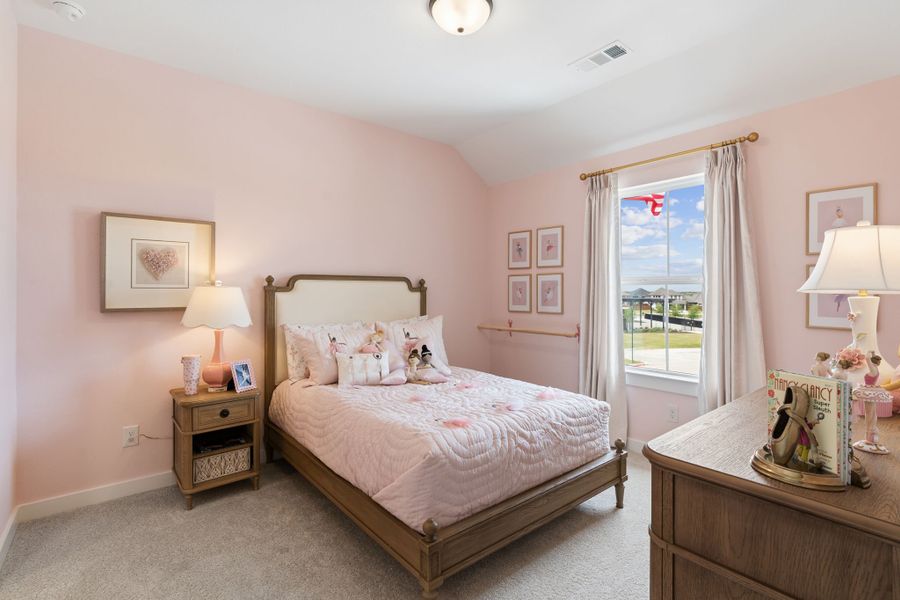Furnished interior in a model home at Sweetgrass 65s in Haslet (Image 43).