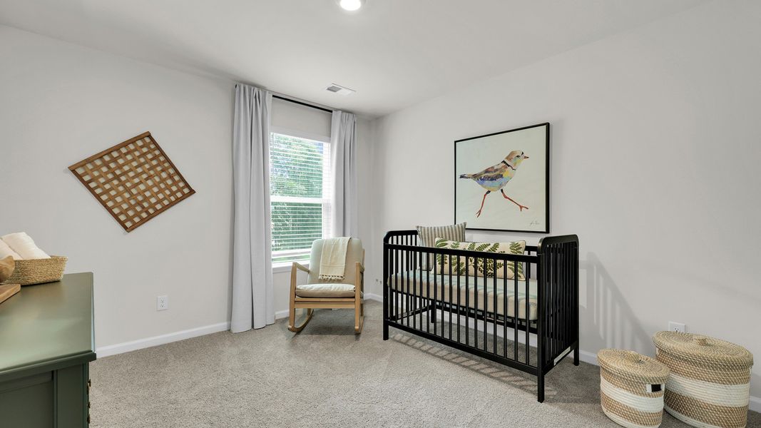 Furnished interior in a model home at The Cove at Mallard Crossing in Summerville (Image 20).