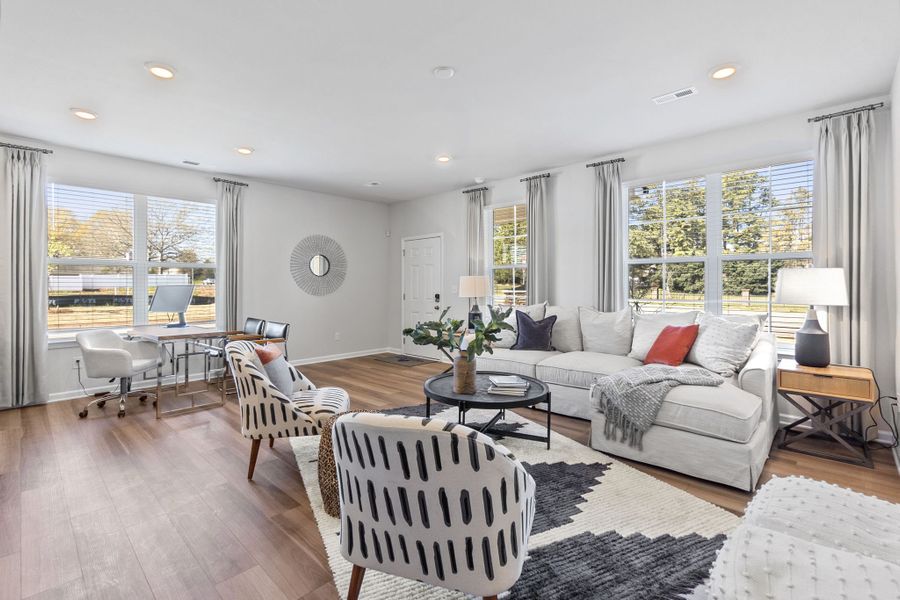 A living room with a large window.
