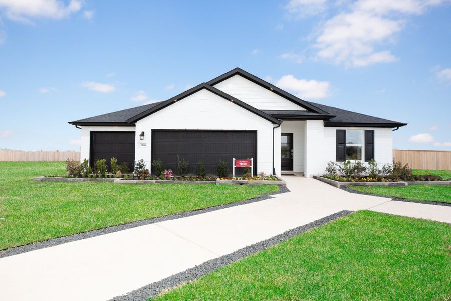Front exterior of a home in the Sunrise Cove: Landmark Collection community, located in Texas City, TX (Image 1). Front exterior of a home in the Sunrise Cove: Landmark Collection community, located in Texas City, TX (Image 1).