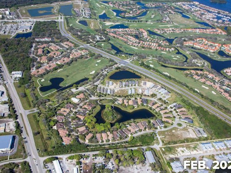 Aerial view of the The Falls at Grand Harbor community in Vero Beach, FL, showing layout and nearby surroundings (Image 14).