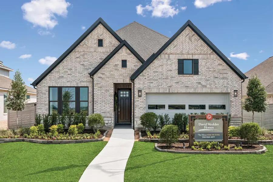 Front exterior of a home in the Legacy community, located in League City, TX (Image 2).