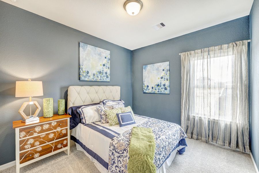 Furnished interior in a model home at Mill Creek Trails in Magnolia (Image 11).