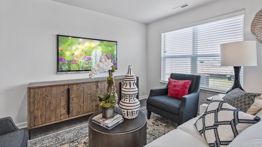 Furnished interior in a model home at The Townes at Honeycutt Oaks in Angier (Image 30).