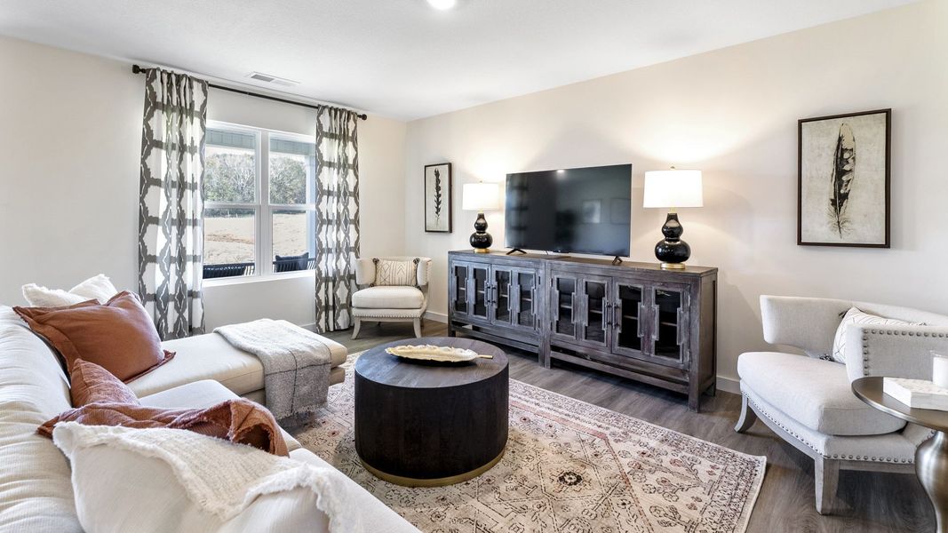 Furnished interior in a model home at Owensby Farms in Dayton (Image 14).