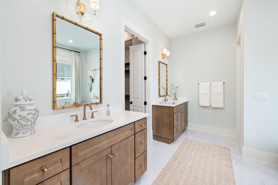 Furnished interior in a model home at Hidden Creek at SilverLeaf 80' Gold Series in St. Augustine (Image 66).