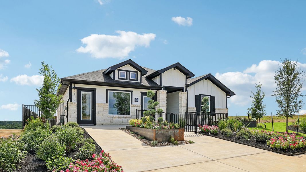 Front exterior of a home in the Revelry community, located in Del Valle, TX (Image 3). Front exterior of a home in the Revelry community, located in Del Valle, TX (Image 3).