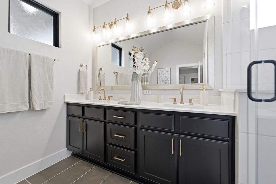 Furnished interior in a model home at Grand Magnolia in Waller (Image 36).
