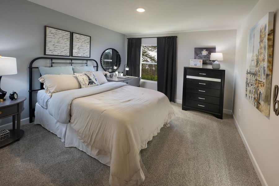 Furnished interior in a model home at Chatham Forest in Duncan (Image 11).