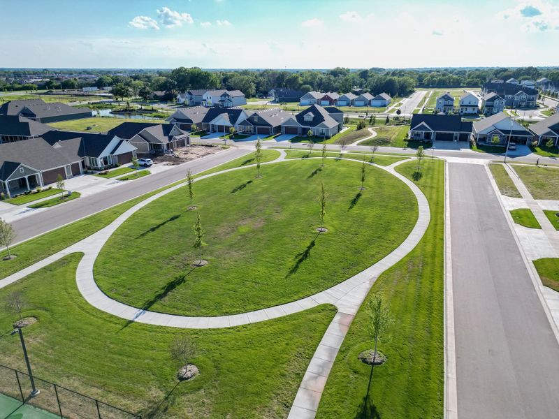 Aerial view of the The Courtyards at The Heritage community in Andover, KS, showing layout and nearby surroundings (Image 24). Aerial view of the The Courtyards at The Heritage community in Andover, KS, showing layout and nearby surroundings (Image 24).