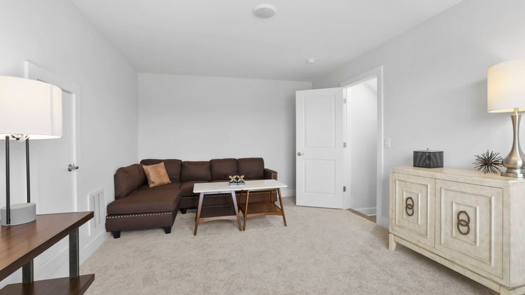 Furnished interior in a model home at Pinebrook in Woodruff (Image 27).