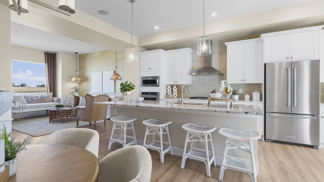 Exquisite marble counters and sleek stainless-steel appliances define this Dillon Pointe haven. Exquisite marble counters and sleek stainless-steel appliances define this Dillon Pointe haven.