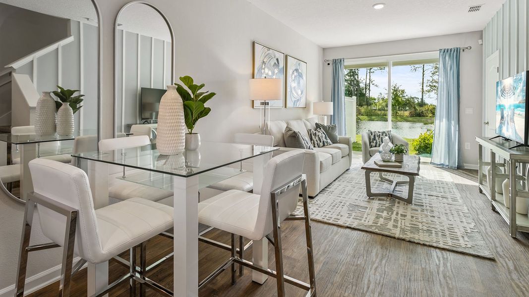 Furnished interior in a model home at Stokes Landing Express in St. Augustine (Image 7).