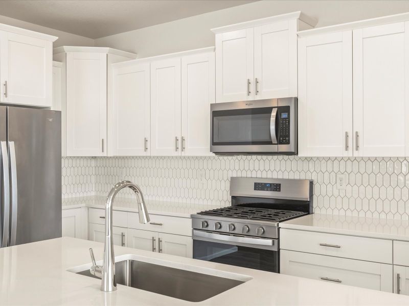 DEN_RidgelineVista_Deercreek_D_Kitchen_506-Grey-Rock-St