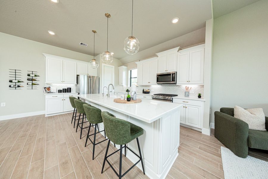 Furnished interior in a model home at Meridiana in Manvel (Image 8).