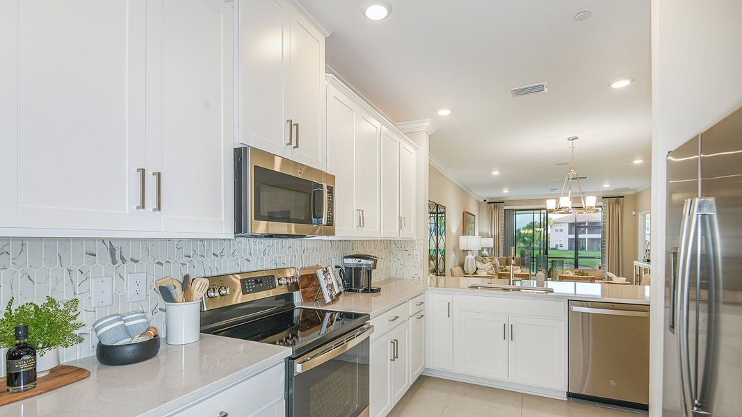 Furnished interior in a model home at Bella Via in Port Charlotte (Image 19). Furnished interior in a model home at Bella Via in Port Charlotte (Image 19).