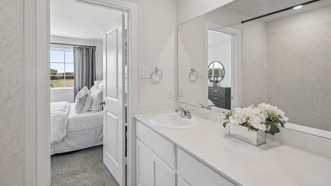 Furnished interior in a model home at Stonewood in Sulphur Springs (Image 32).