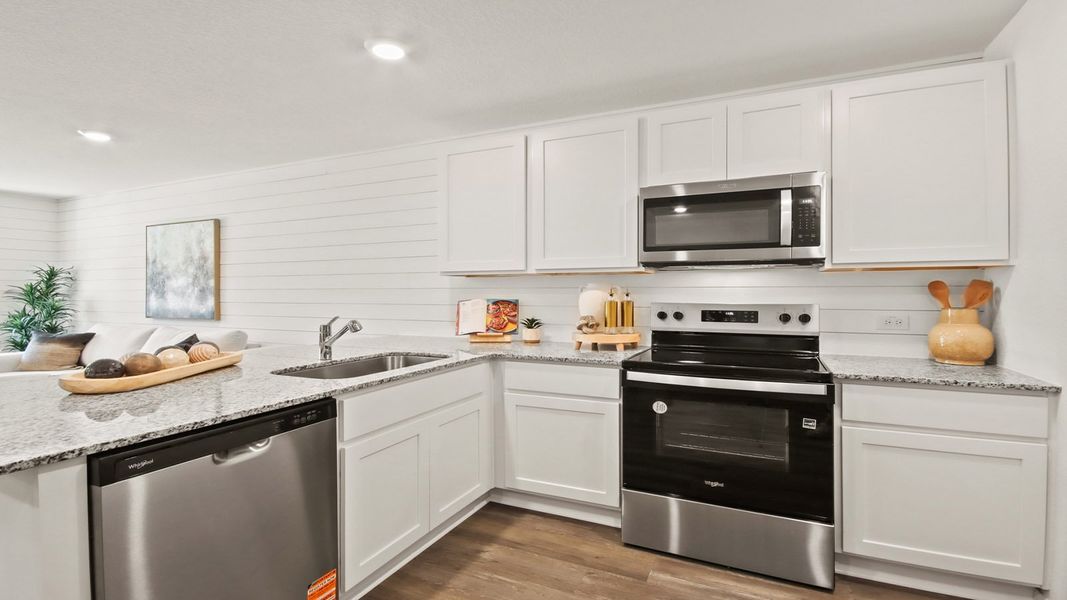 Furnished interior in a model home at Castles Edge in Willis (Image 6).