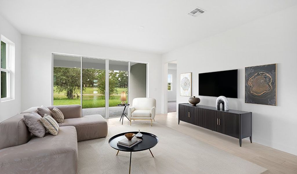 Furnished interior in a model home at Troon Creek Preserve in Leesburg (Image 16).