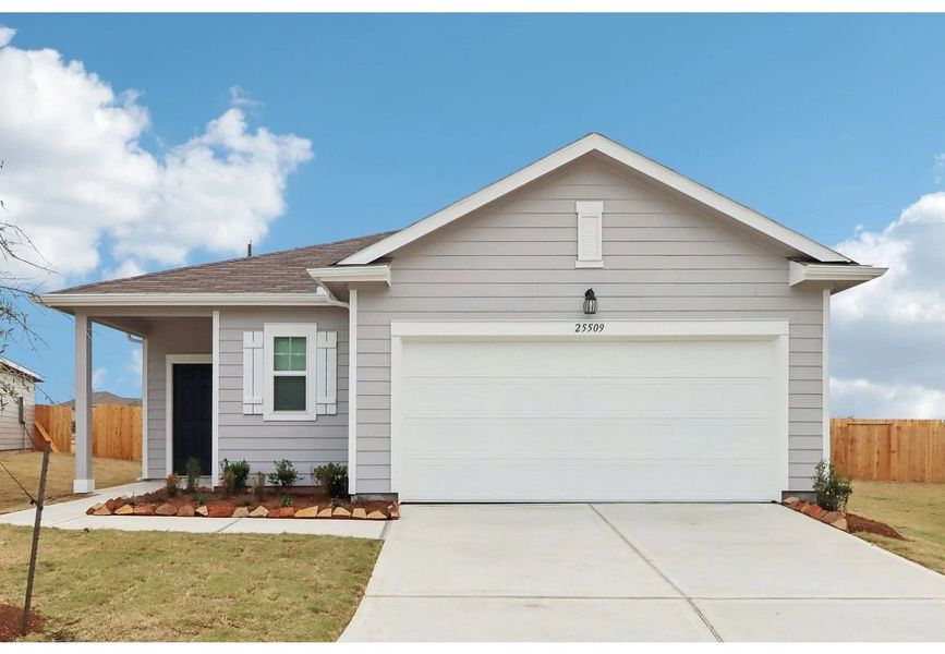 Front exterior of a home in the Royal Pines community, located in Porter, TX (Image 9).