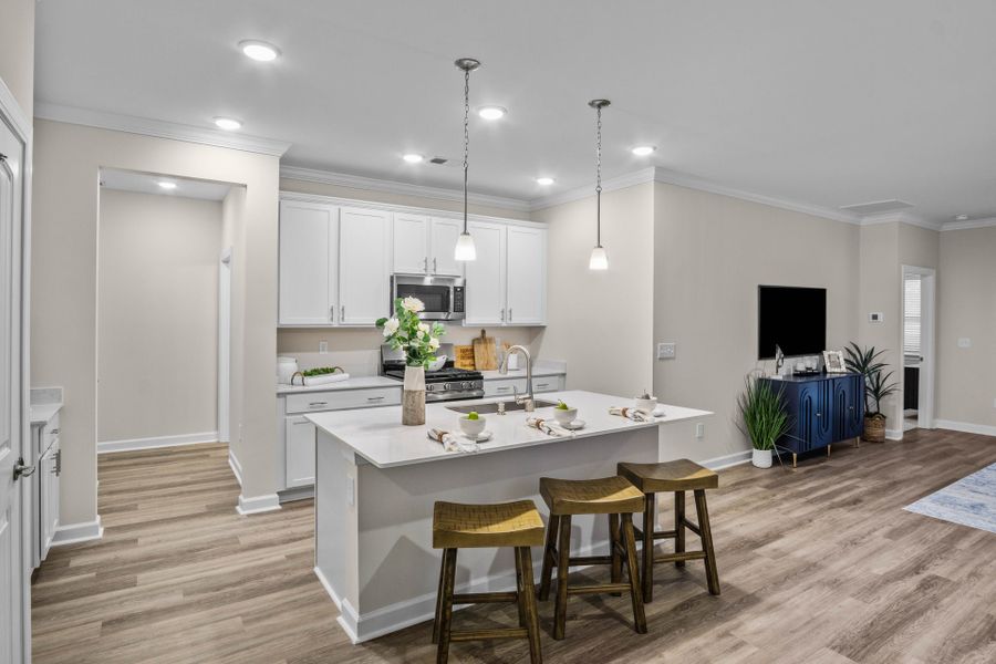 Furnished interior in a model home at The Paired Villas at Bridgewater in Little River (Image 6).