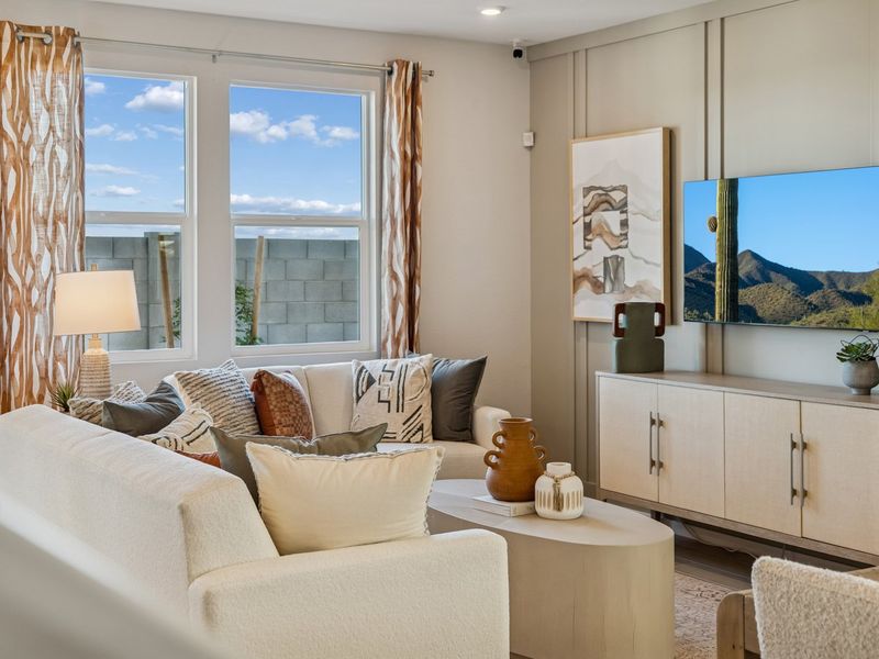 A living room with a large window.