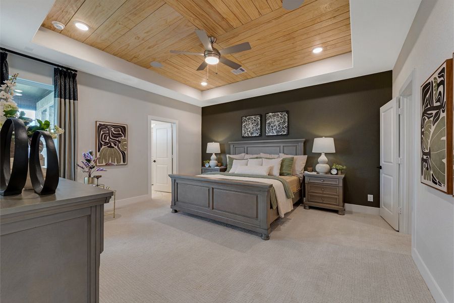 Furnished interior in a model home at Sunterra Lakes in Brookshire (Image 28).