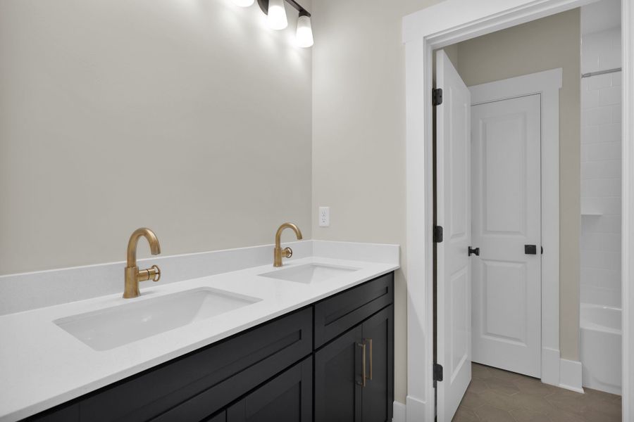 Furnished interior in a model home at Hidden Creek at SilverLeaf in St. Augustine (Image 39).